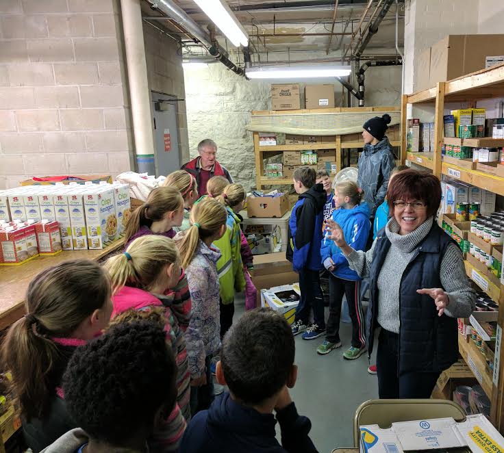 WCS Elementary Students Stock the Food Pantry Shelves